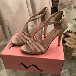 Gorgeous Nina dress sandal, brand new in box. Size 8M. Color is champagne gold